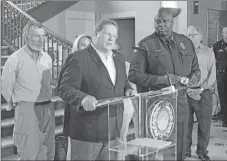  ?? Associated Press ?? Little Rock Mayor Mark Stodola speaks at a news conference next to Police Chief Kenton Buckner in Little Rock, Ark. on Saturday about an early morning shooting at a night club that left at least 28 people injured.