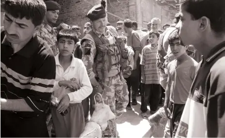  ?? PA ?? Col Tim Collins, then commander of the 1st Battalion of the Royal Irish Regiment, in the Iraqi province of Al Amara