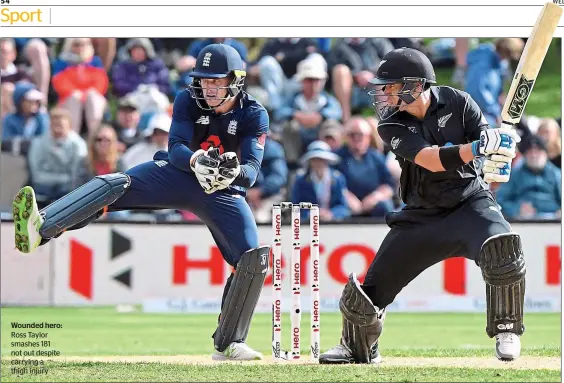 ??  ?? Wounded hero: Ross Taylor smashes 181 not out despite carrying a thigh injury