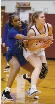  ?? Krystal Elmore/Special to Herald-Leader ?? Rogers guard Brooklyn Owens guards Siloam Springs’ Kaidence Prendergas­t during a game on Nov. 28 at Panther Activity Center.