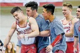  ?? [PHOTO PROVIDED BY TY RUSSELL] ?? The Sooners could become just the third program in NCAA history to win four consecutiv­e men’s gymnastics titles this weekend.