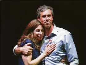  ?? Jerry Lara / Staff photograph­er ?? Beto O’Rourke, with his wife, Amy Sanders, concedes the race Tuesday night during a rally at Southwest University Park in El Paso.