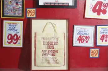  ?? RENÉ JOHNSTON/TORONTO STAR ?? Framed Honest Ed’s signs are being sold at Soho Art and Custom Framing for a high price tag.