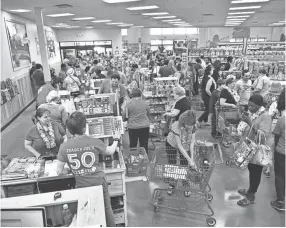  ??  ?? Trader Joe's officially opened on Sept. 14, drawing hundreds to the Germantown store's unveiling. STAN CARROLL / FOR THE COMMERCIAL APPEAL