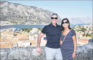  ?? SUBMITTED PHOTO ?? Reporter Steve MacNaull and his wife, Kerry, take a break while hiking along Kotor’s city wall.