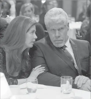  ?? Karen Ballard Amazon Studios ?? RON PERLMAN portrays a vengeance-seeking judge, with Dana Delany as his wife, in “Hand of God.”