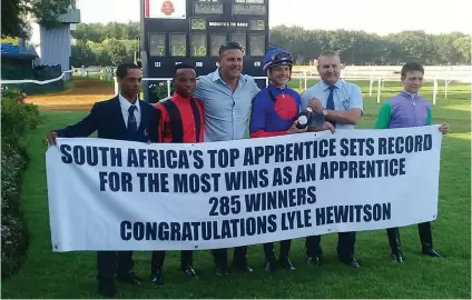  ?? Picture: JC Photograph­ics ?? LONG WAIT. Lyle Hewitson had to wait until Race 8 at the Vaal yesterday before the banners could be brought out to celebrate his record of the most wins by an apprentice. See story on Page 3.