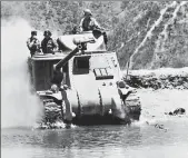  ?? IWM VIA GETTY IMAGES ?? An M3 Lee tank crosses a river to meet the Japanese advance in March 1944 during the Battle of Imphal.