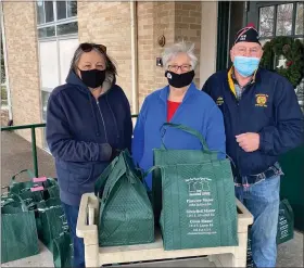  ?? PHOTO COURTESY OF CHUCK HASKIN ?? Oxford VFW Post 334 Auxiliary member Vicki Haskin (from left), Post 334 Auxiliary President Kathy Hubbard and Post 334 Commander Jim Hubbard deliver 44 bags of food to the Oxford Senior Meal’s on Wheel’s program.