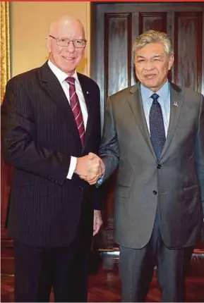  ?? BERNAMA PIC ?? Deputy Prime Minister Datuk Seri Dr Ahmad Zahid Hamidi being greeted by New South Wales Governor General David Hurley in Sydney yesterday.