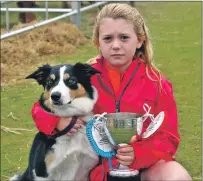  ??  ?? A delighted Rachel Carre, 10, with her collie Gem and the Seaton Trophy for Best Dog in Show.