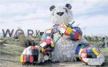  ?? REUTERS ?? A plastic waste panda is displayed at the Green Zone during the COP27 climate summit in Sharm el Sheikh, Egypt on Thursday.