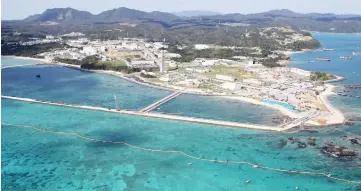  ??  ?? This aerial view shows land reclamatio­n work on the Henoko coastal district of Nago, Okinawa prefecture to build a new site for relocating a US military airbase. — AFP photo