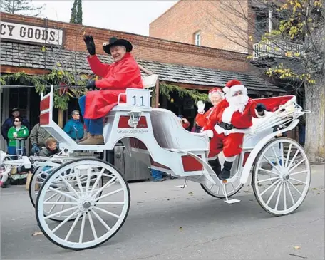  ?? California State Parks ?? THE EQUESTRIAN PARADE is one of several seasonal, western-themed events at Columbia State Historic Park in the Sierra foothills.