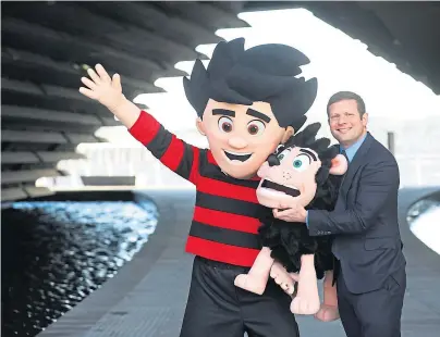  ??  ?? ‘BROUGHT IT ALL BACK’: National Television Awards host Dermot O’Leary meeting Dennis The Menace