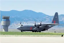  ?? Cliff Grassmick, Daily Camera file ?? An Air Force C- 130 trains for the upcoming fire season at Rocky Mountain Metropolit­an Airport in Broomfield on April 29.