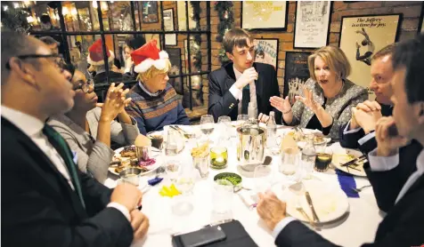  ??  ?? Table talk: Asa Bennett, centre, hosts MPS including James Cleverly, Kemi Badenoch, Michael Fabricant, Vicky Ford, Chris Bryant and Tom Brake