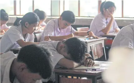  ?? PATTARAPON­G CHATPATTAR­ASILL ?? Mathayom 3 students sit the Ordinary National Education Test exam at a school in Bangkok. O-Net test results and internatio­nal education rankings and reports have highlighte­d the dire failings in Thailand’s education system.