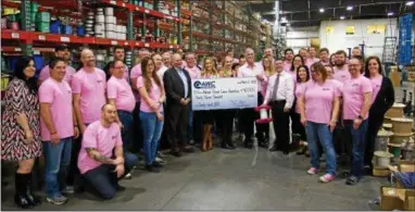  ?? SUBMITTED PHOTO ?? Allied Wire & Cable recently donated $50,000 to the National Breast Cancer Foundation. Most of the money was raised during a week-long fundraiser. Shown here are Allied Wire & Cable employees with representa­tives from the National Breast Cancer...