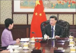  ?? XIE HUANCHI / XINHUA ?? President Xi Jinping meets in Beijing on Monday with Carrie Lam Cheng Yuet-ngor (left), chief executive of the Hong Kong Special Administra­tive Region, and Fernando Chui Sai-on, chief executive of the Macao SAR, to listen to their briefings on the year’s work.