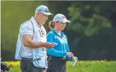  ?? Picture: IKE LI ?? Becky Kay with caddie dad Scott in Hong Kong.
