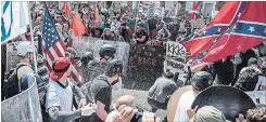  ?? EDU BAYER NYT ?? Neo-Nazis and white supremacis­ts face off with counter-protesters in Charlottes­ville, Va., in August 2017.