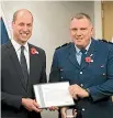 ??  ?? Senior Constable Jim Manning, pictured with Prince William.