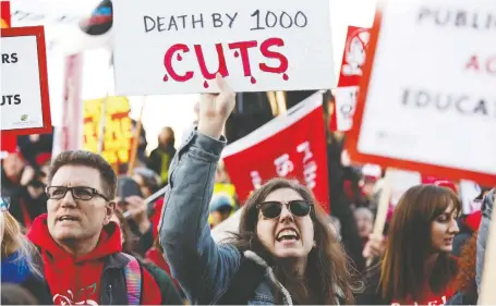  ?? IAN KUCERAK ?? Teachers, union members and supporters rally at the provincial Legislatur­e against the 2020 Alberta budget on Thursday.