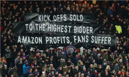  ?? Photograph: John Sibley/Action Images via Reuters ?? Crystal Palace supporters at Selhurst Park make their feelings clear as their game was officially the first to be broadcast live by Amazon Prime.