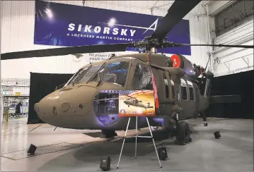  ?? Hearst Connecticu­t Media file photo ?? The 1,000th H60M Black Hawk helicopter at the delivery ceremony at the Sikorsky plant in Stratford in October 2016.