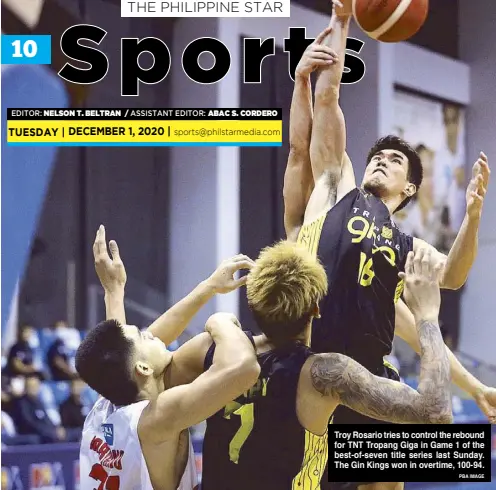  ?? PBA IMAGE ?? Troy Rosario tries to control the rebound for TNT Tropang Giga in Game 1 of the best-of-seven title series last Sunday. The Gin Kings won in overtime, 100-94.