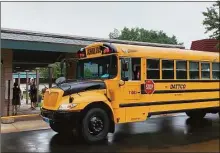  ?? File photo ?? A school bus arrives at a Middletown school earlier this year.