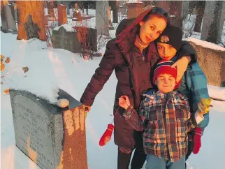  ?? COURTESY MCGRAW FAMILY ?? Desirée McGraw at the gravesite of her daughter Catherine, who was stillborn at 36 weeks. She is channellin­g her grief into a campaign to help other mothers who experience perinatal loss.