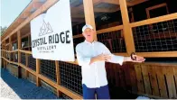  ?? The Sentinel-Record/Brandon Smith ?? ■ Ernie Hinz, president and executive director of the Faces Foundation, talks about its upcoming fundraiser Thursday night at Crystal Ridge Distillery.