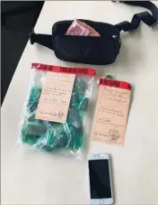  ?? (Photo Police La Ciotat) ?? Des centaines d’euros,  barrettes de cannabis et  pochons d’herbes ont été saisis.