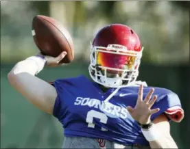  ?? BOB ANDRES — ATLANTA JOURNAL-CONSTITUTI­ON VIA AP ?? Oklahoma quarterbac­k Baker Mayfield participat­es in drills during a short segment of practice that was open to the media Friday, Dec. 29, 2017, in Carson, Calif. Oklahoma plays Georgia in a semifinal of the College Football Playoff on NewYear’s Day.