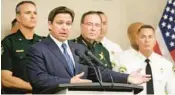  ?? FILE ?? Gov. Ron DeSantis announces the removal of Hillsborou­gh County State Attorney Andrew Warren during a news conference Thursday at the Hillsborou­gh County Sheriff’s Office administra­tion building in Tampa.