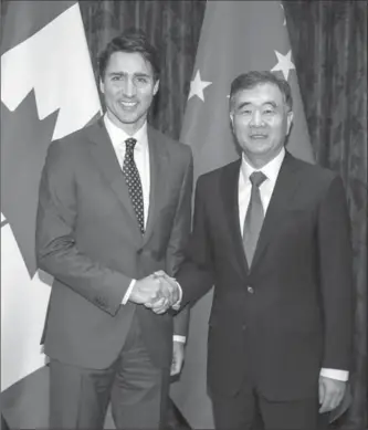  ?? LI TAO/XINHUA, TNS ?? Chinese Vice Premier Wang Yang meets with Prime Minister Justin Trudeau. Trudeau’s trade mission failed to secure agreement on issues like the environmen­t and human rights linked to trade agreements.