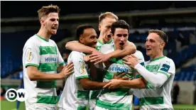  ??  ?? Greuther Fürth's players celebrate a famous win over top-flight opponents Hoffenheim