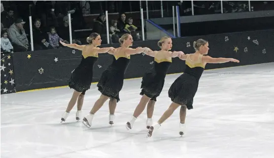  ?? DAN MARCINKOWS­KI ?? Members of the Black Gold synchroniz­ed skating club from Calgary rehearse a routine. There are several age categories making up the Black Gold programs.