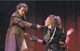  ?? Carson French / Ubuntu Theater Project ?? Lauren Spencer as Macduff (left) and Emilie Whelan as Macbeth in “Macbeth.”