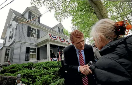  ?? PHOTO: REUTERS ?? US Congressma­n Joe Kennedy III greets a well-wisher during ceremonies on the 100th anniversar­y of the birth of Congressma­n Kennedy’s great-uncle, U.S. President John F. Kennedy, outside the home where President Kennedy was born in Brookline,...