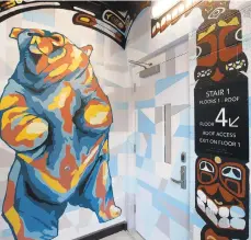  ??  ?? Students at Baum School of Art in Allentown helped Matt Halm paint life-sized bears in a paint-by-numbers style on the fourth floor.