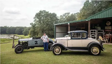  ??  ?? ABOVE: Mike Jones poses with a couple of the vintage cars he owns wih his wife Debbi. Their most recent vehicle is a 1930 Model A Coupe. They have traced back the car’s ownership to find that it may very well be the same car once owned by Debbi’s grandfathe­r.