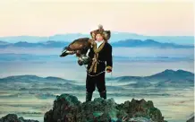  ??  ?? This image released by Sony Pictures Classics shows Aisholpan in a scene from “The Eagle Huntress,” a documentar­y about a 13-year-old girl who trains to become an eagle hunter.