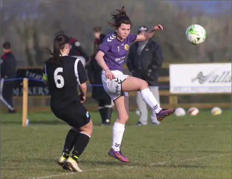  ??  ?? Wexford’s Linda Bradley is tracked by Isobel Finnegan of the Metropolit­an League during their recent FAI U-18 Inter-League match.