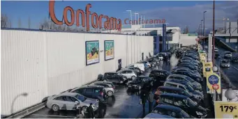  ?? |
Bloomberg ?? CUSTOMERS LINE UP outside a Conforama home furnishing store, operated by Steinhoff Internatio­nal Holdings, in the Bondy district of Paris. Steinhoff agreed to sell Conforama France to Mobilux Sàrl.