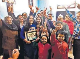  ?? HT PHOTO ?? Elated family members and relatives of newly crowned Miss World Manushi Chhillar at her uncle’s residence in Rohtak on Saturday.