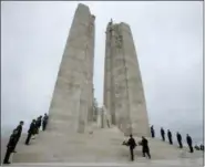  ?? ADRIAN WYLD — THE CANADIAN PRESS VIA AP ?? Canadian Prime Minister Justin Trudeau places a wreath on the Canadian National Vimy Memorial Saturday Nov. 10, 2018 at Vimy Ridge, France.