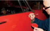  ??  ?? 20
On any bodywork that has to be drilled, trimmed or otherwise finessed in some way, any bare metal that gets exposed should be protected with paint. Simon keeps a tin of red Hammerite handy for this purpose.